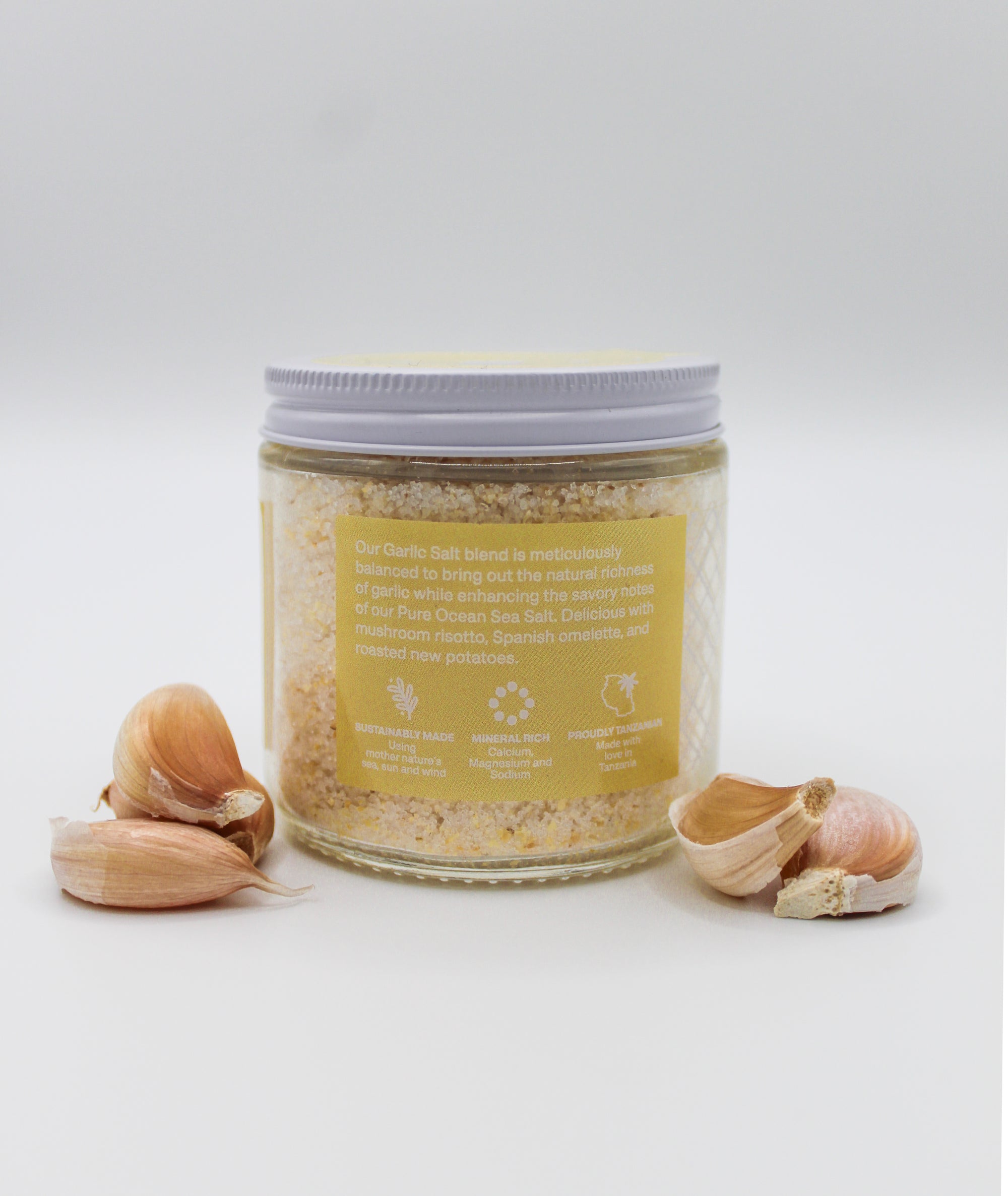 Side of Garlic Salt Jar with Garlic Cloves